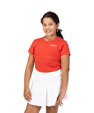 Golfing Era Tee Red — Girls' Golf Tee, front view, full length on model