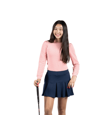 Love Lightweight Top Rose Pink — Girls' Golf Top, front view, full length on model, holding a club