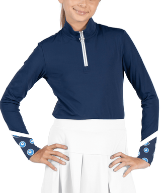 Birdie Vibes LS Shirt Navy / Evil Eyes — Women's Golf Long Sleeve, front view, on model, hands on the hips, close up of the evil eyes cuffs