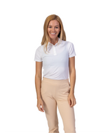Woman wearing the RB Polo in White with khaki pants, front view, full length
